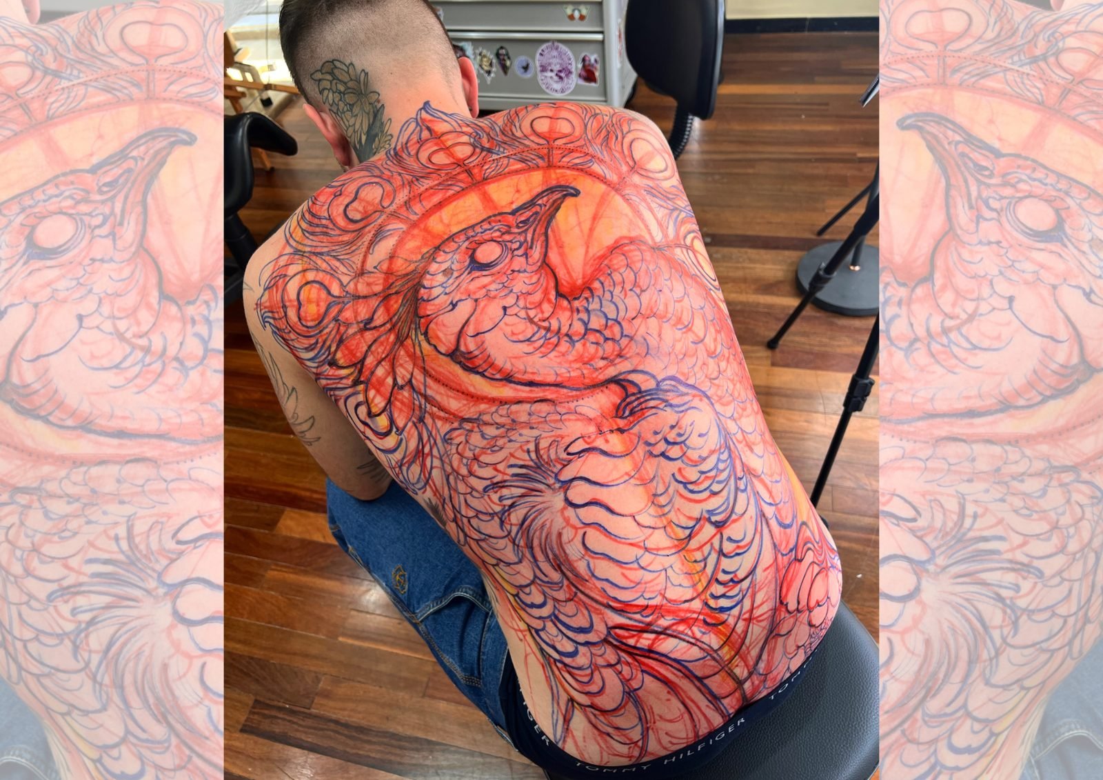 Freehand de fênix desenhado nas costas, à mão livre
