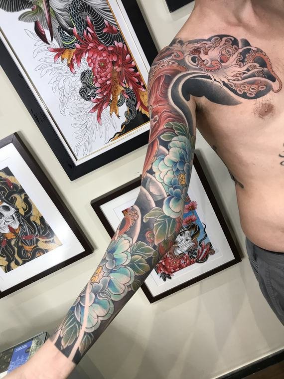 Serpente e ondas, tatuagem de Denis Vazios